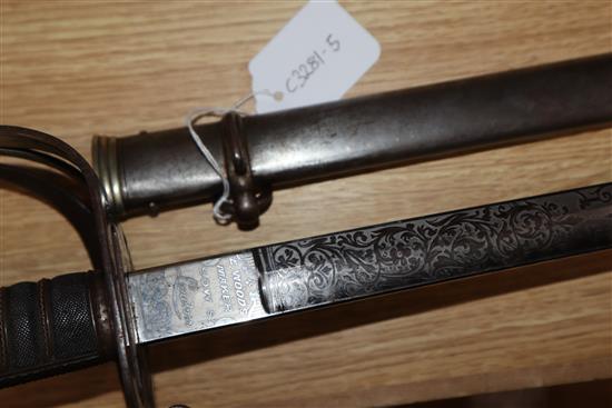 An E. Woods Officers dress sword presented by Serjt Major Mattham by his Comrades in Battery 4th F.A.V length 99cm